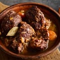 Slow Cooker Spanish Pork Cheeks Braised with Beans